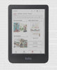 A Kobo Clara Colour eReader set on a background showing faint type,  with its screen showing books with colourful covers in the Kobo Store.