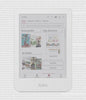 A Kobo Clara Colour eReader set on a background showing faint type,  with its screen showing books with colourful covers in the Kobo Store.